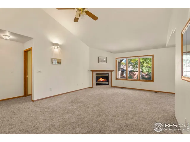 a view interior of a house with an empty space and a window