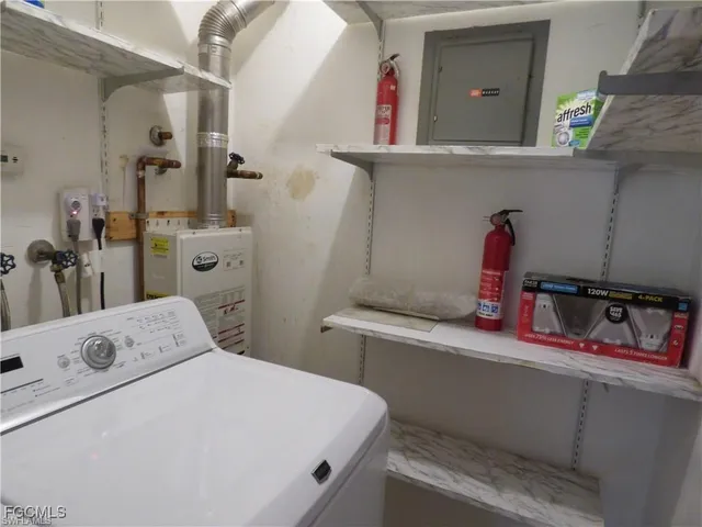 a bathroom with a bathtub and next to a window