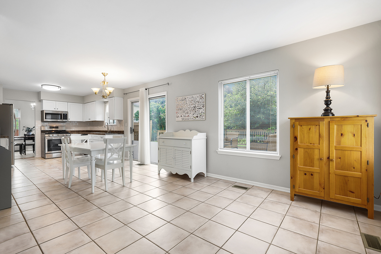 596 Buckboard Road Bolingbrook, IL 60490 - Photo 15 of 30 a view of a kitchen with furniture and a kitchen