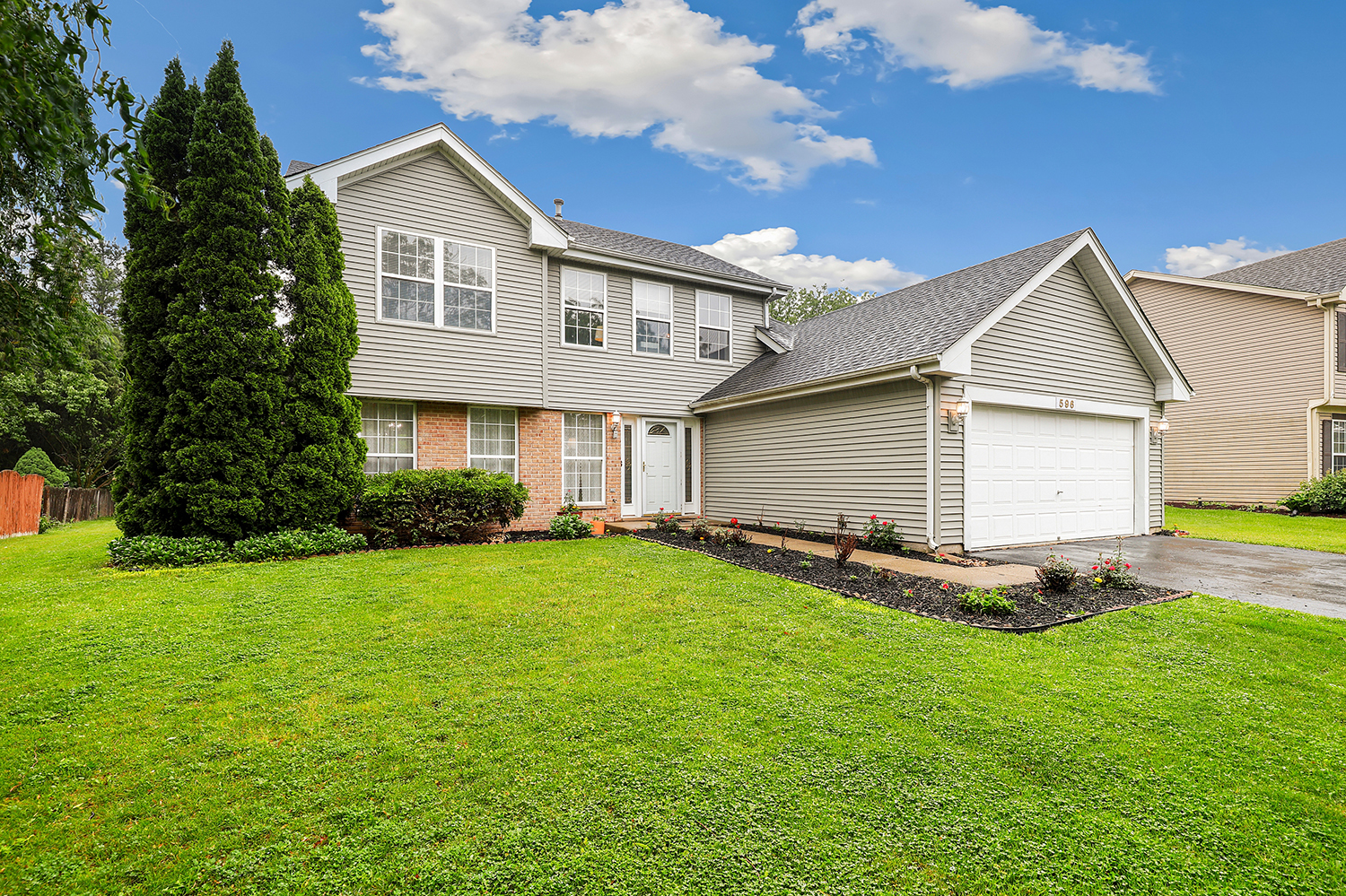 596 Buckboard Road Bolingbrook, IL 60490 - Photo 2 of 30 a front view of house with yard and green space