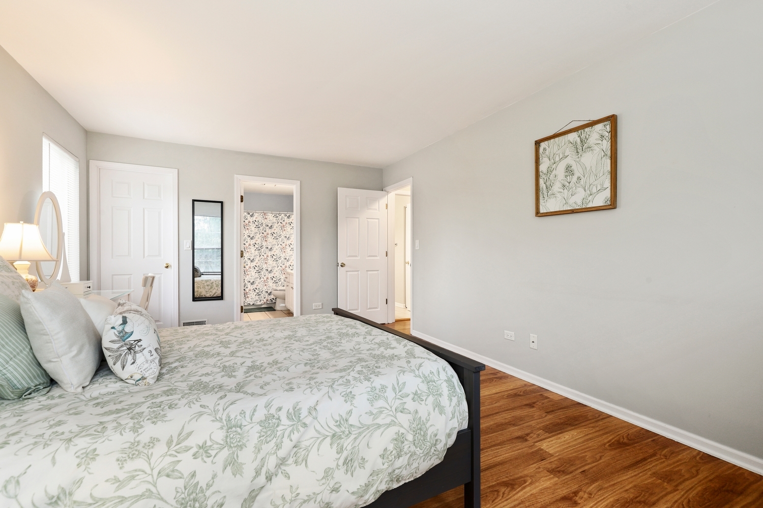 596 Buckboard Road Bolingbrook, IL 60490 - Photo 22 of 30 a bedroom with a bed and wooden floor