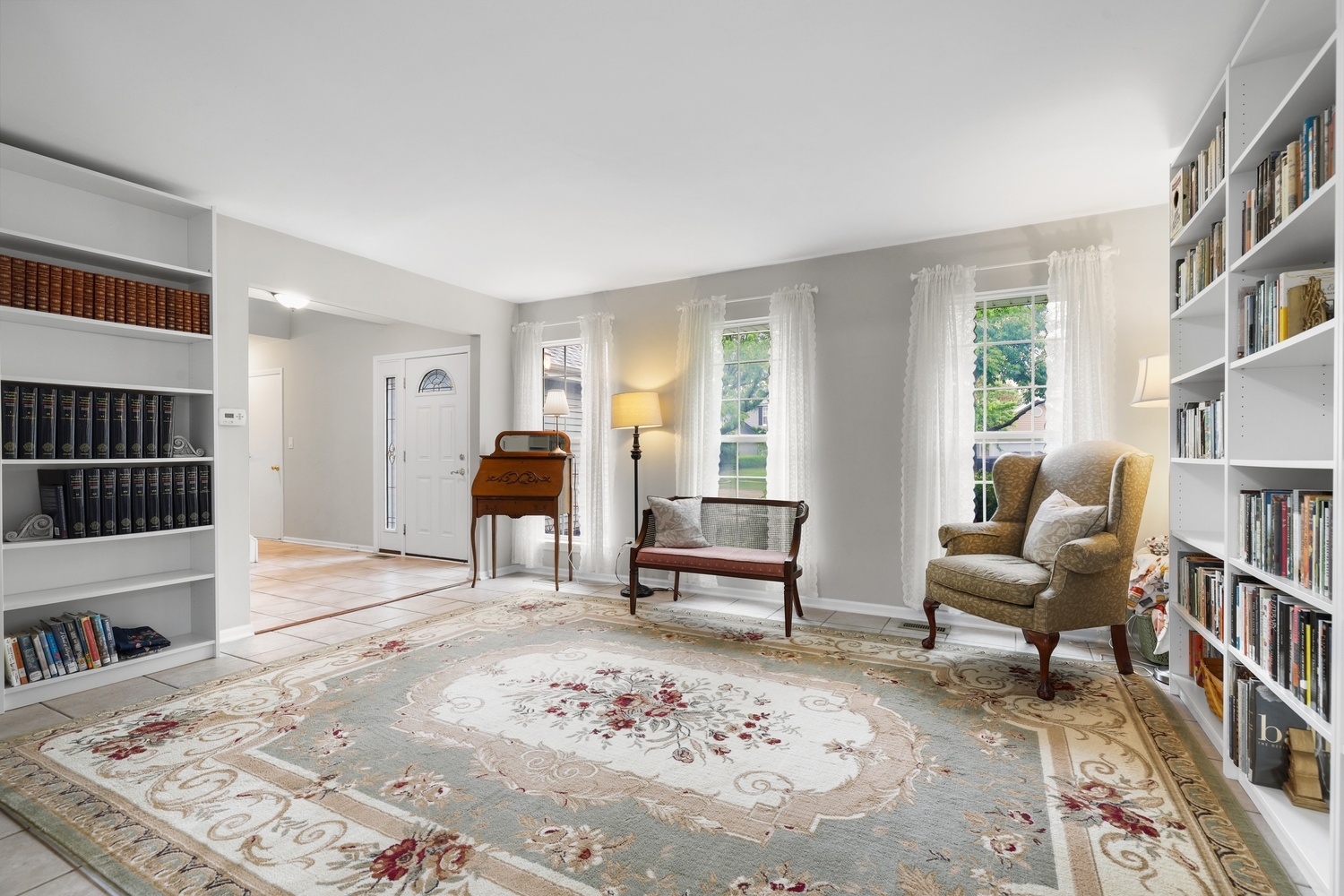 596 Buckboard Road Bolingbrook, IL 60490 - Photo 4 of 30 a living room with furniture and a rug
