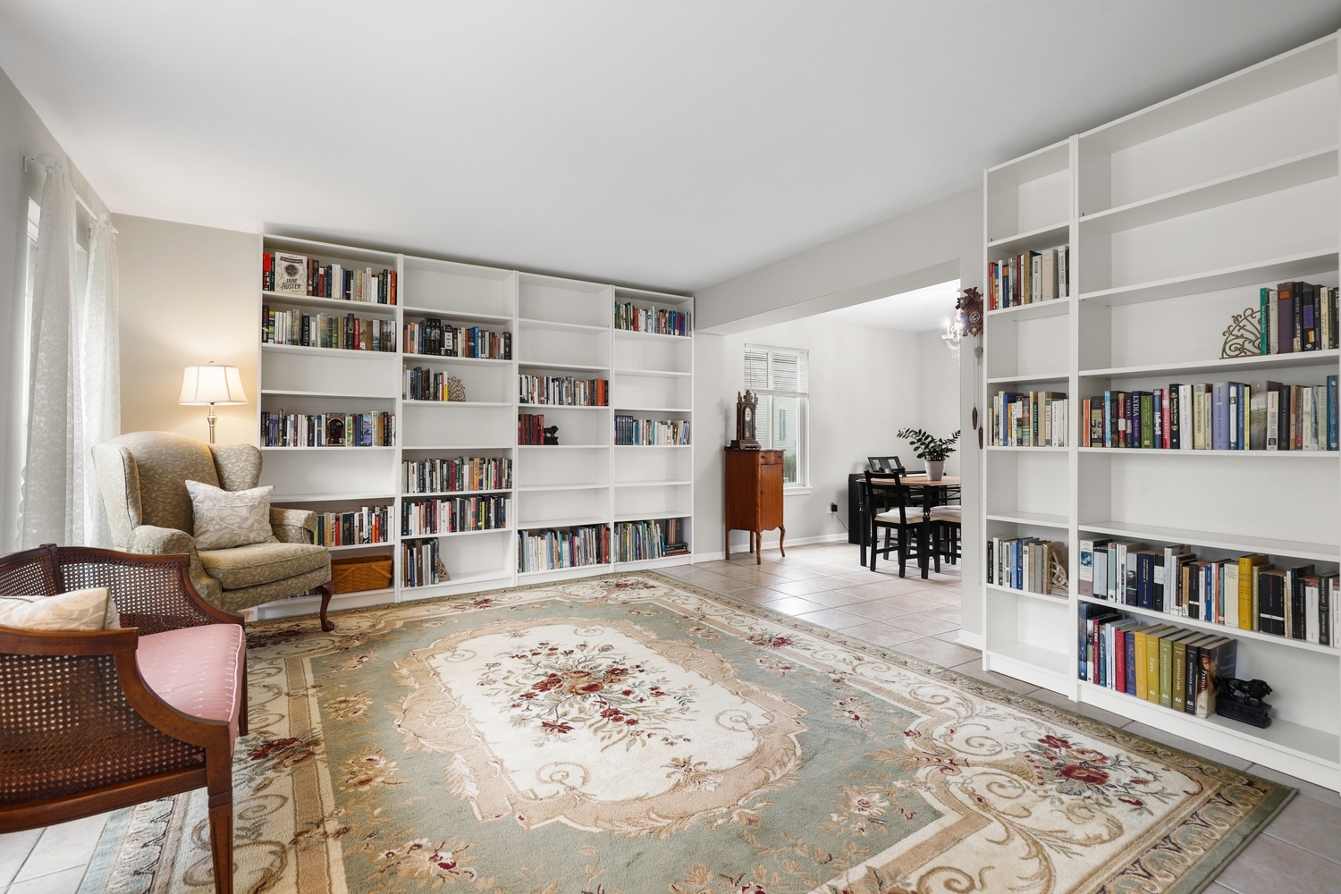 596 Buckboard Road Bolingbrook, IL 60490 - Photo 6 of 30 a living room with furniture and a book shelf