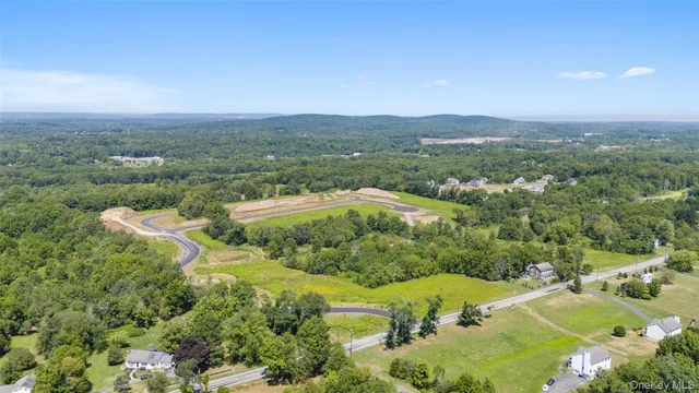 an aerial view of residential house with outdoor space