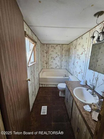 $82,500 | 121 Muledeer Street, Opal, WY 83124