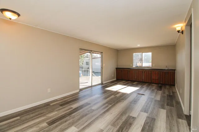 a view of an empty room and window