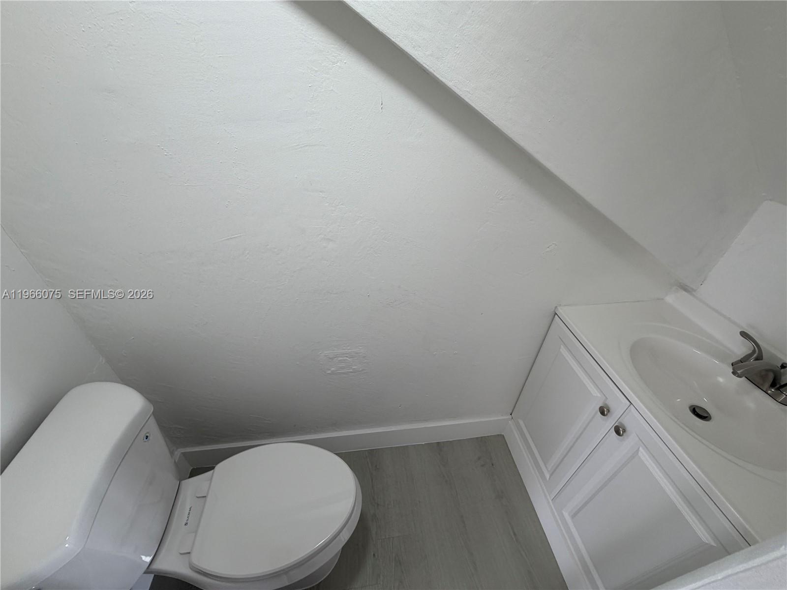 1104 West 44th Street, Unit 87 Hialeah, FL 33012 - Photo 13 of 13 a bathroom with a toilet and a sink