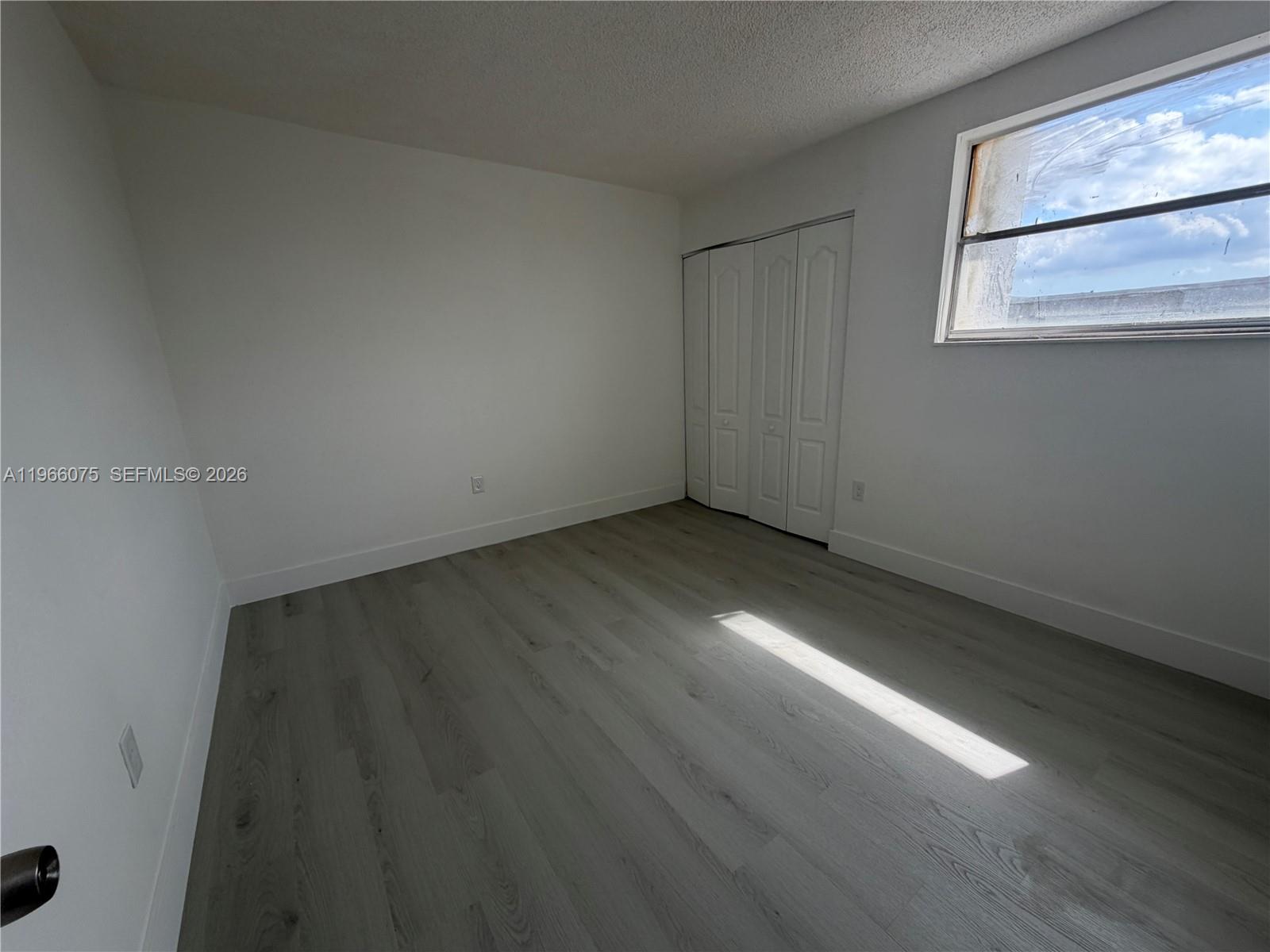1104 West 44th Street, Unit 87 Hialeah, FL 33012 - Photo 9 of 13 a view of room with window