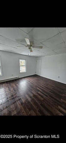 a view of bathroom with a toilet