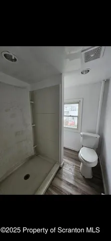 a view of a room with an empty space