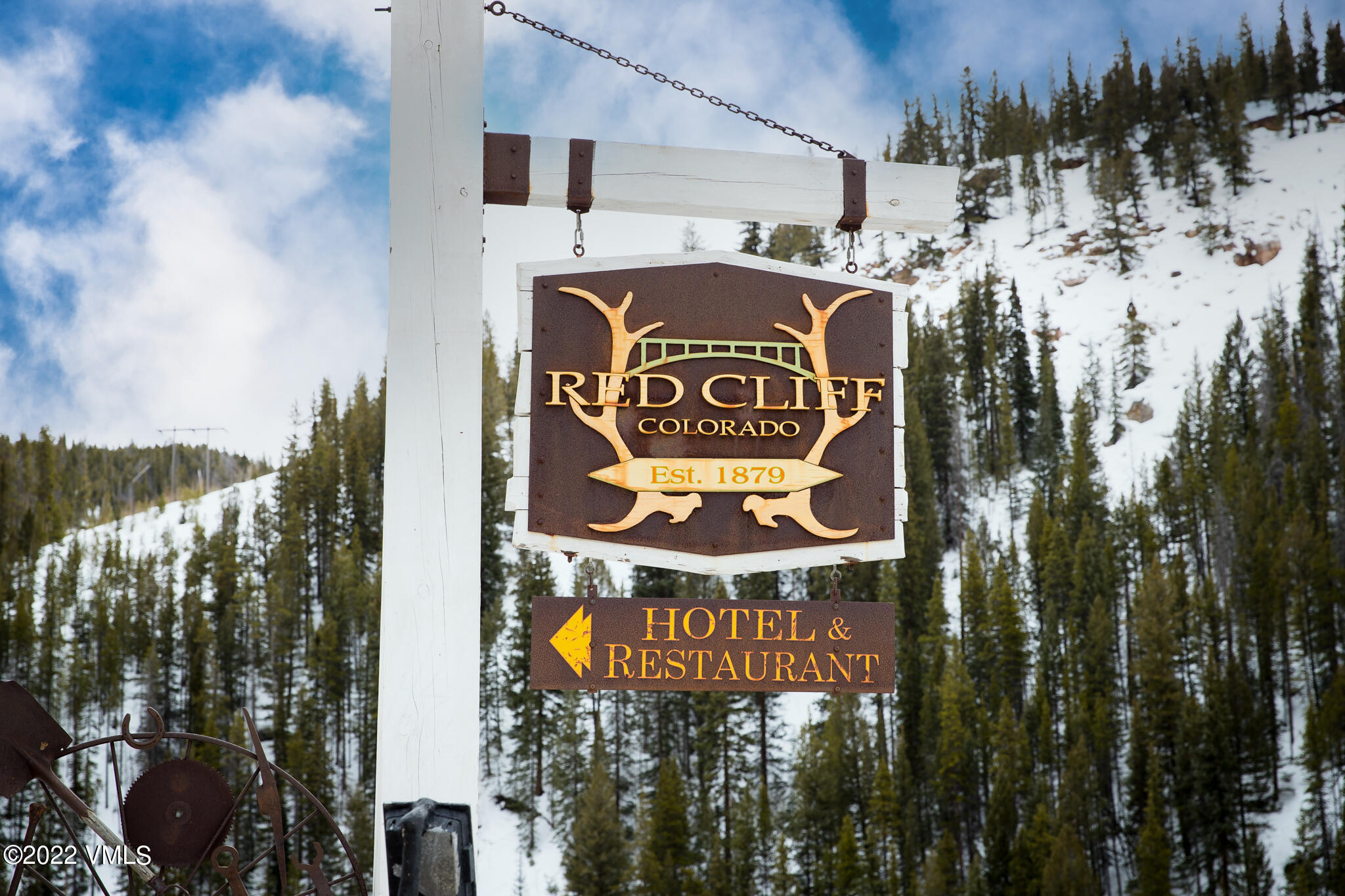 383 Pine Street Red Cliff, CO 81649 - Photo 1 of 31 a sign that is on the wall of a building
