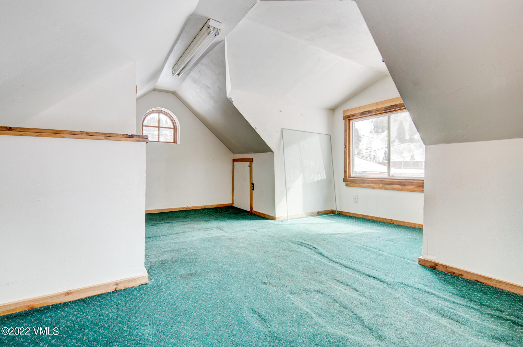383 Pine Street Red Cliff, CO 81649 - Photo 14 of 31 an empty room with windows