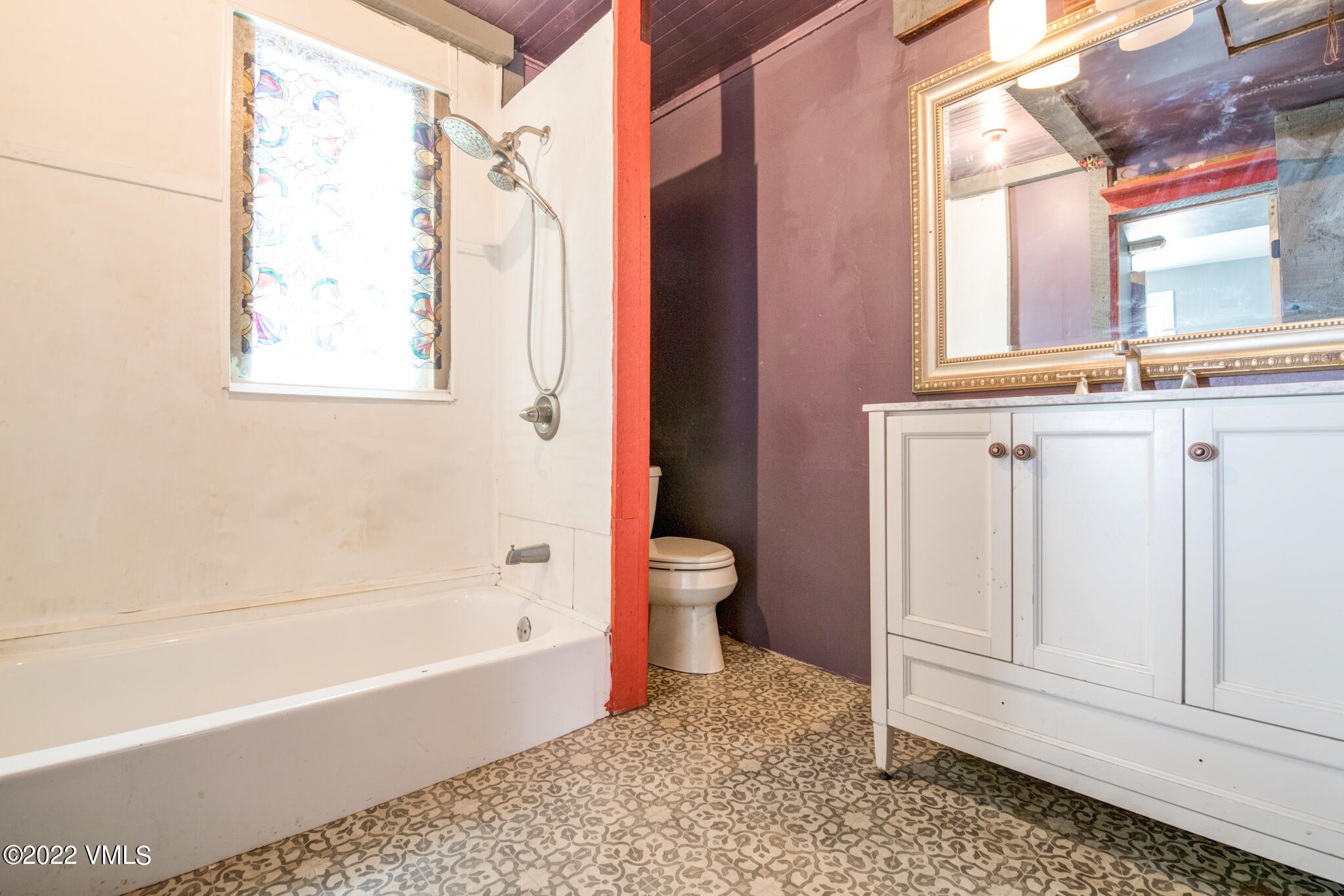 383 Pine Street Red Cliff, CO 81649 - Photo 9 of 31 a bathroom with a granite countertop bathtub shower sink and mirror