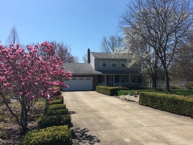 9320 Island Road North Ridgeville, OH 44039 - Photo 2 of 34 front view in spring