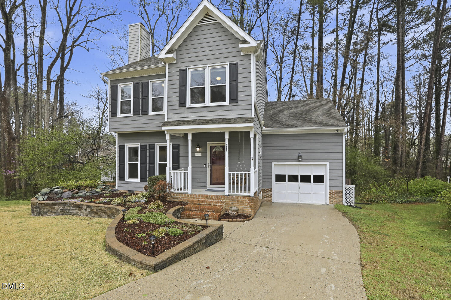 2717 Rockbridge Court Raleigh, NC 27604 - Photo 1 of 16 a front view of a house with swimming pool and porch