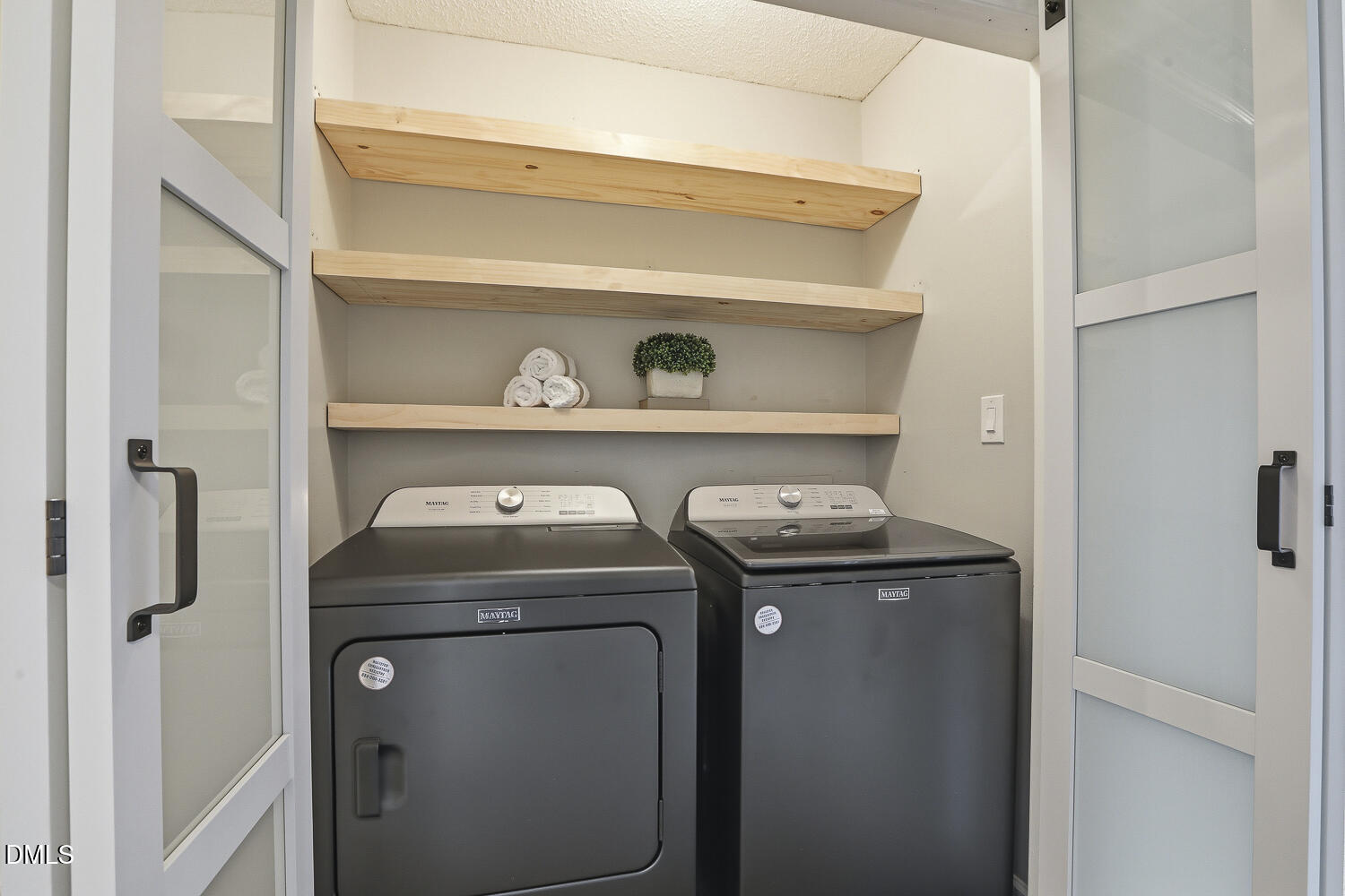2717 Rockbridge Court Raleigh, NC 27604 - Photo 10 of 16 a utility room with dryer and washer