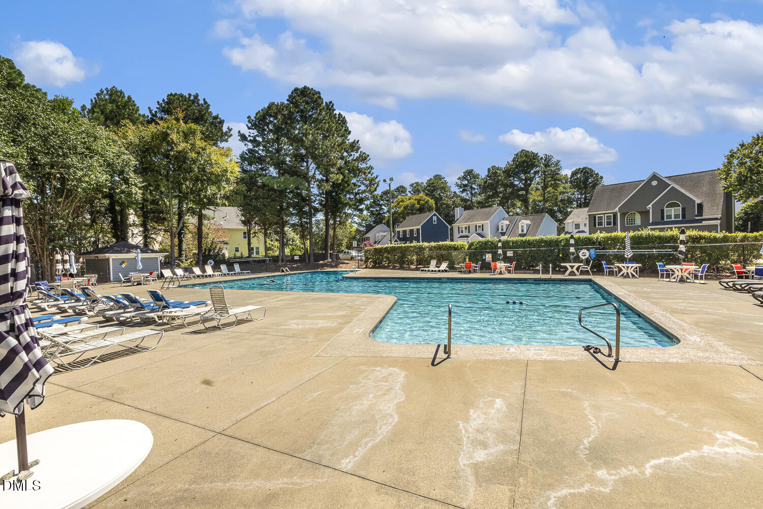 2717 Rockbridge Court Raleigh, NC 27604 - Photo 13 of 16 a view of backyard with swimming pool and seating space