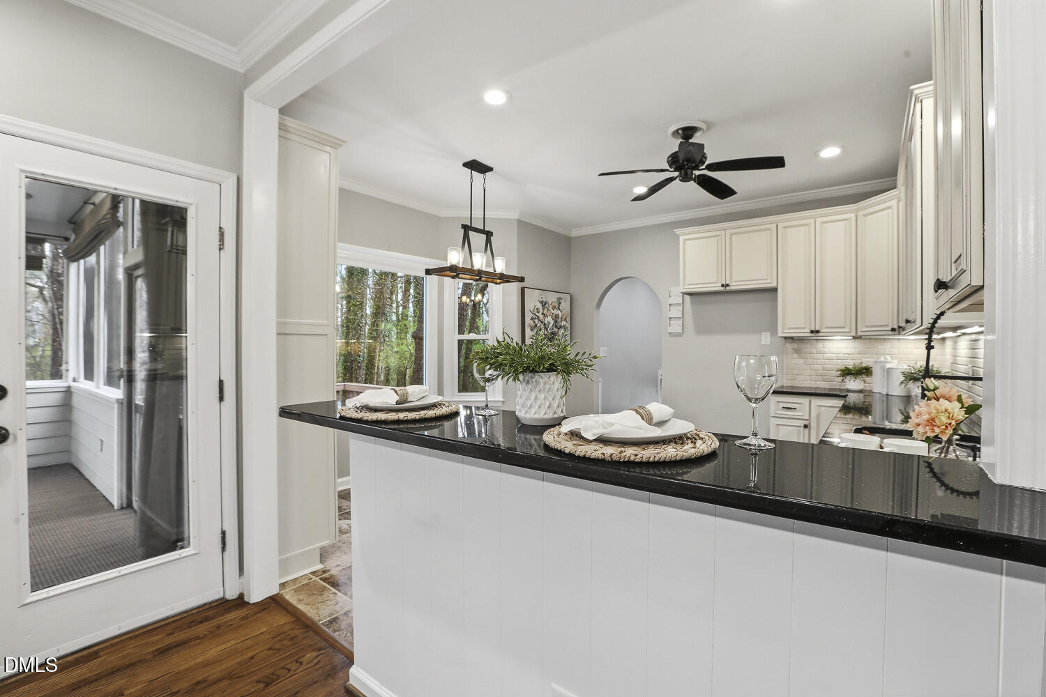 2717 Rockbridge Court Raleigh, NC 27604 - Photo 4 of 16 a kitchen with stainless steel appliances kitchen island granite countertop a sink and cabinets