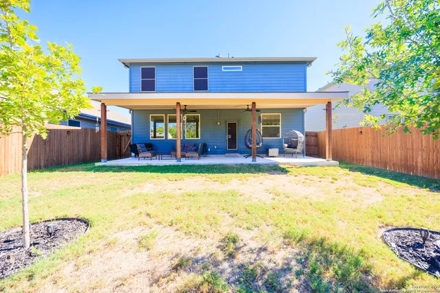 front view of a house with a swimming pool