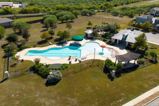 an aerial view of a swimming pool