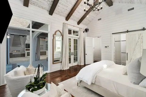 a bathroom with a tub and a shower