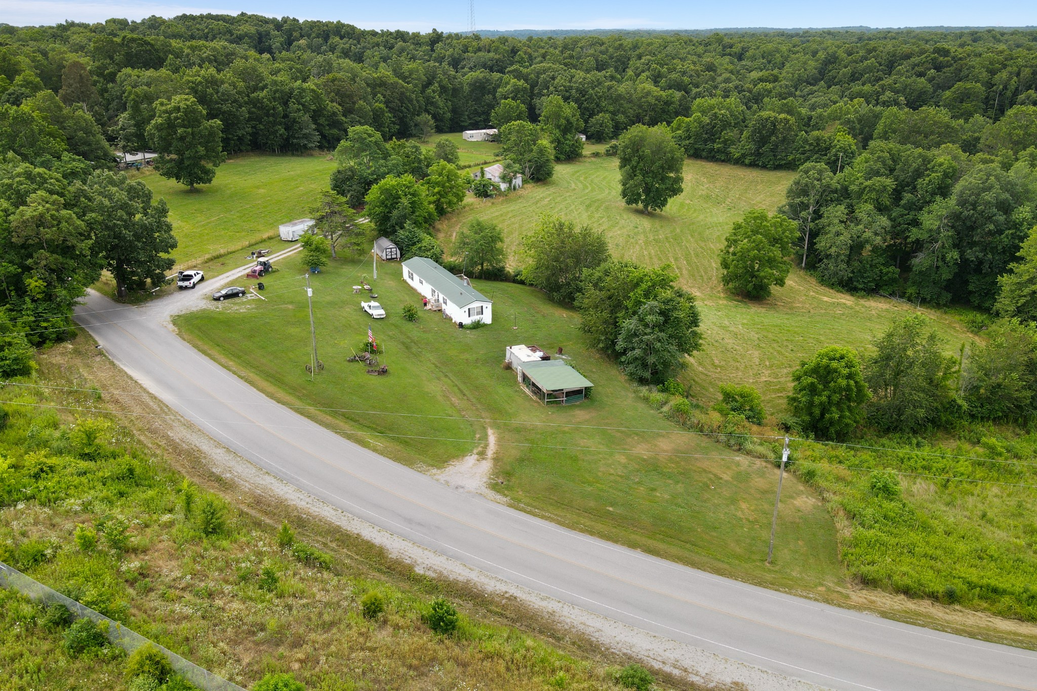 3925 Mobley's Cut Road Columbia, TN 38401 - Photo 3 of 31 a view of a lake with a yard