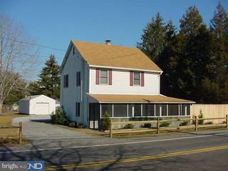 39 Magnolia Road Pemberton, NJ 08068 - Photo 1 of 6 a front view of a house with a yard