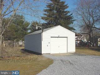39 Magnolia Road Pemberton, NJ 08068 - Photo 6 of 6 a house with trees in front of it