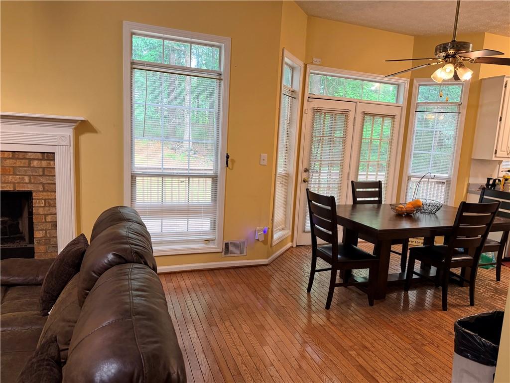 426 Pates Lake Court Hampton, GA 30228 - Photo 45 of 60 a living room with furniture and a table