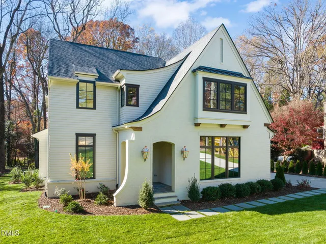 an aerial view of house with yard
