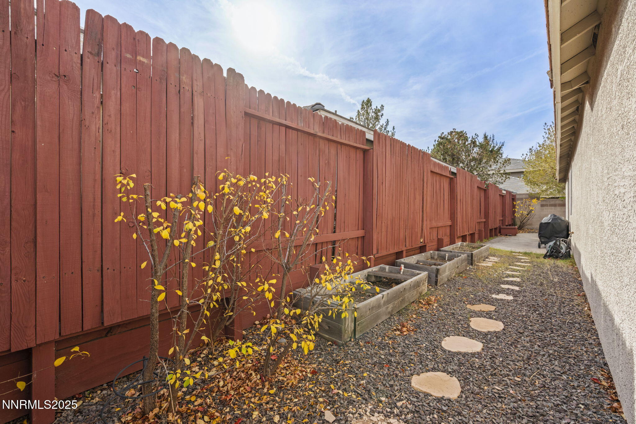 9721 Ripple Way Reno, NV 89521 - Photo 17 of 22 a view of a backyard with potted plants
