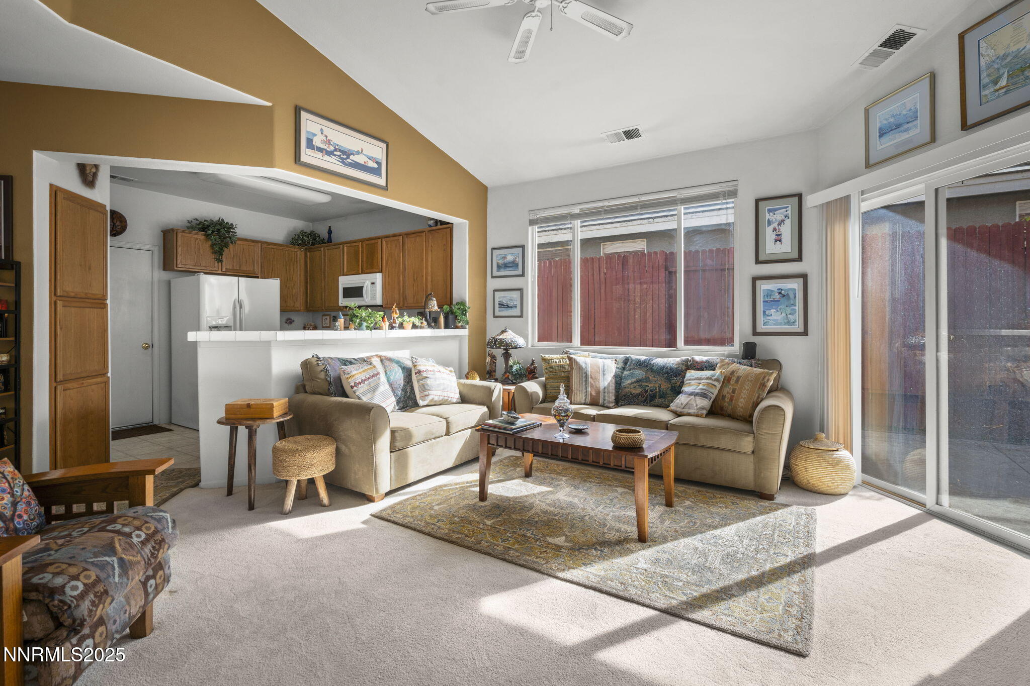 9721 Ripple Way Reno, NV 89521 - Photo 4 of 22 a living room with furniture and large windows