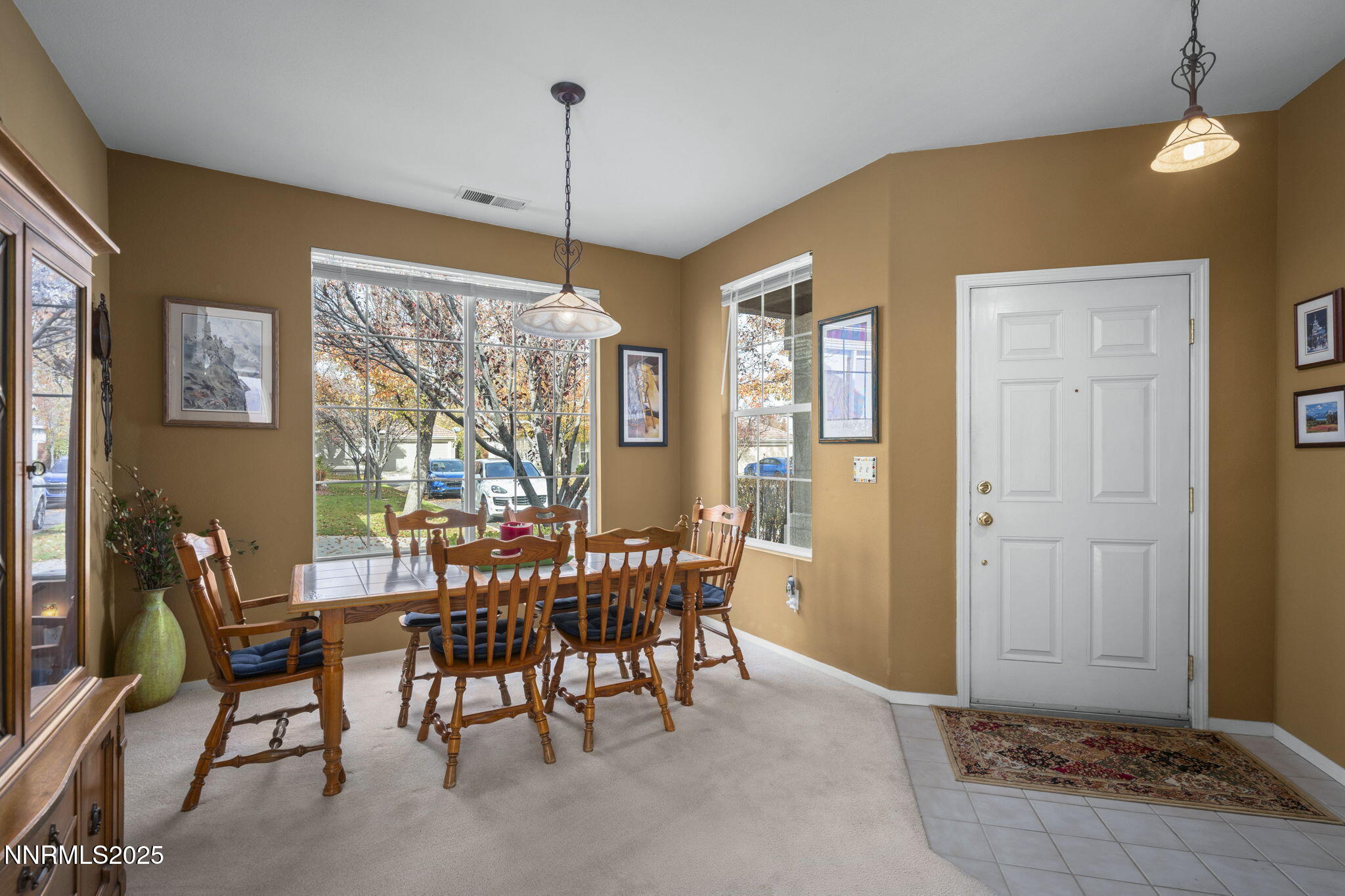 9721 Ripple Way Reno, NV 89521 - Photo 9 of 22 a view of a dining room with furniture window and outside view