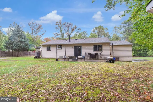 front view of a house with a big yard