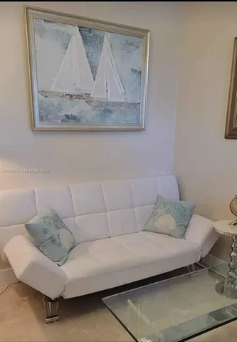 a living room with a couch and a table