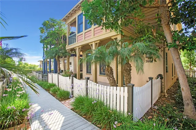a view of a house with brick walls