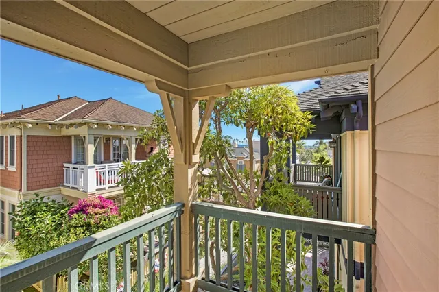 a view of a house with a flower garden