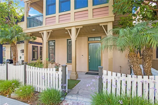 a front view of a house with a small yard