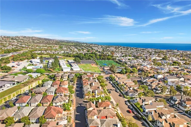 an aerial view of residential building with parking space