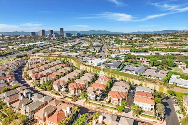 an aerial view of residential building with parking space