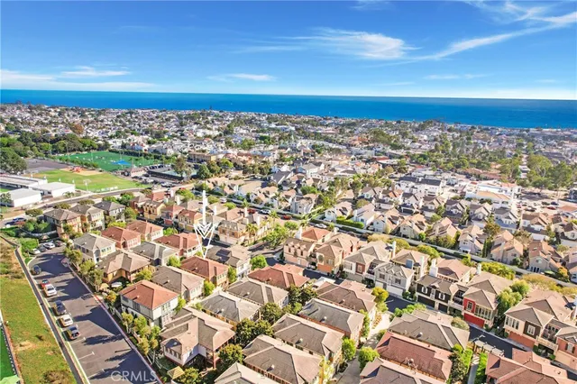 an aerial view of a city with lots of residential buildings