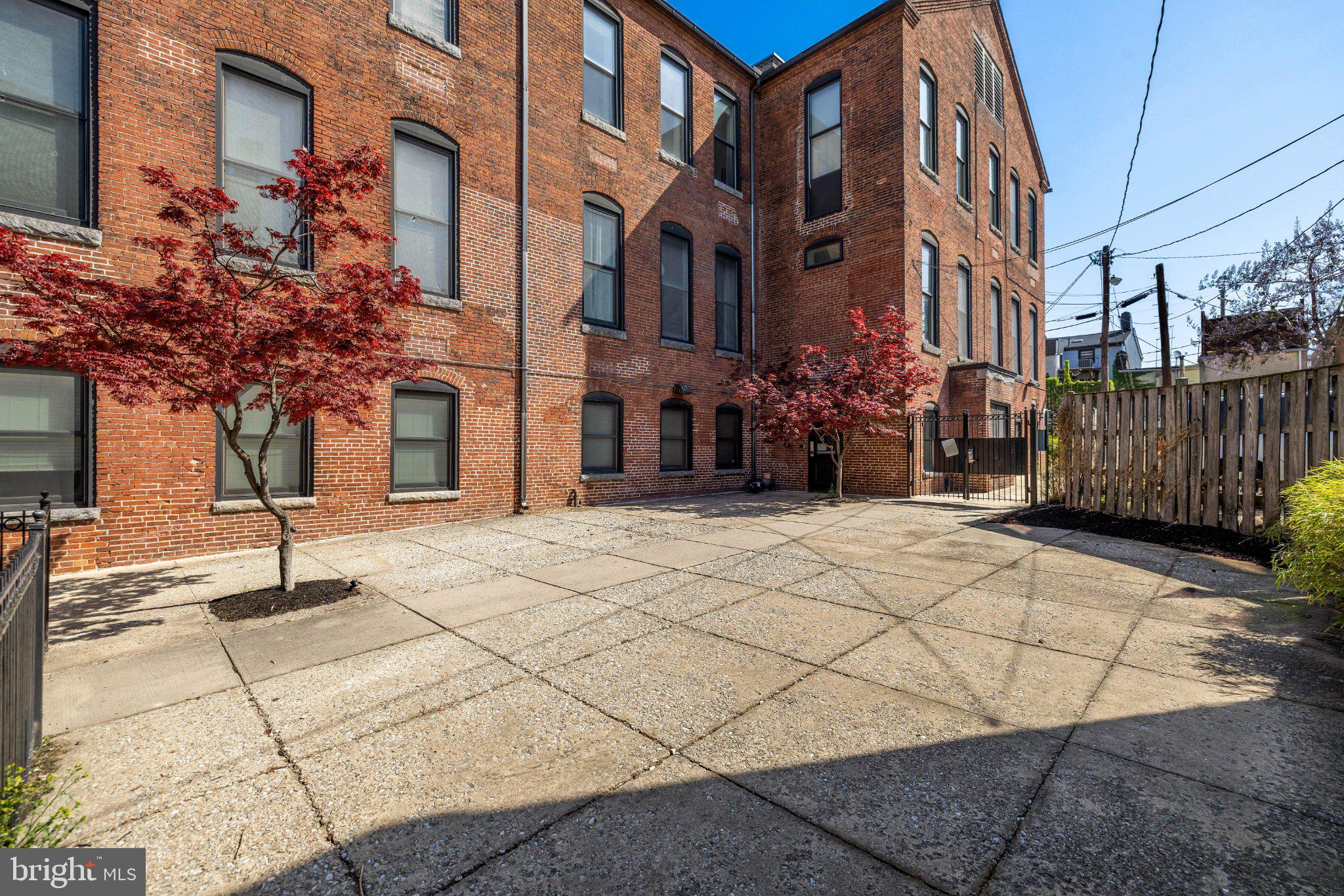511 South Bond Street, Unit 302 Baltimore, MD 21231 - Photo 22 of 24 a street view with tall buildings