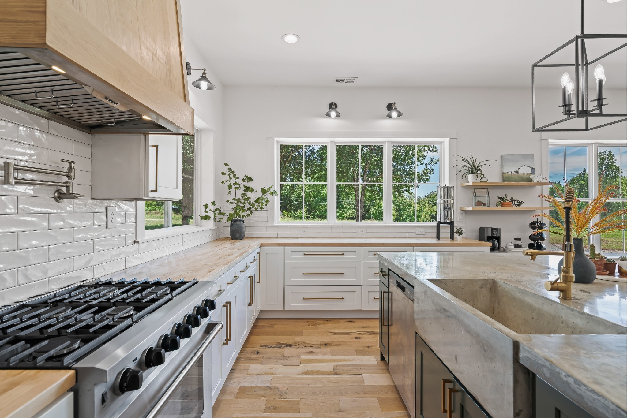 3322 Franklin Road Lebanon, TN 37090 - Photo 26 of 63 a kitchen with stainless steel appliances granite countertop a sink stove and cabinets