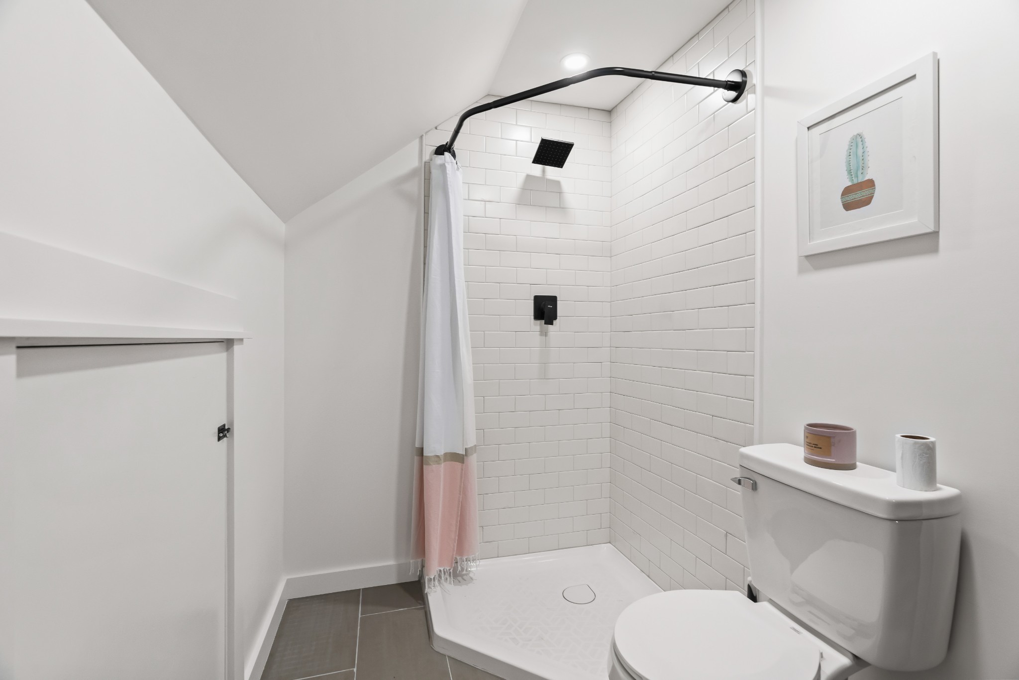 3322 Franklin Road Lebanon, TN 37090 - Photo 51 of 63 a white toilet sitting next to a bathroom sink