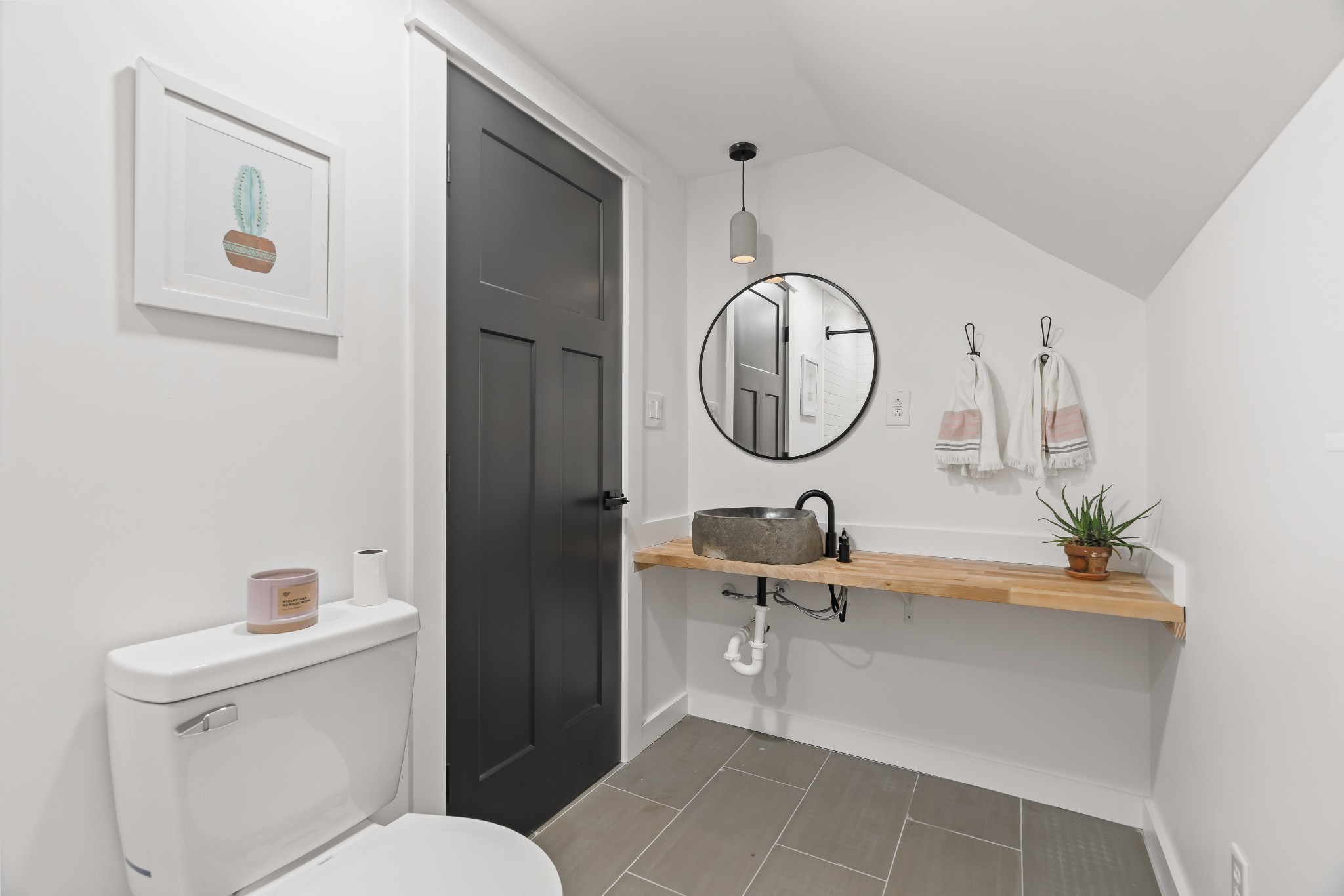 3322 Franklin Road Lebanon, TN 37090 - Photo 52 of 63 a bathroom with a toilet a sink and a mirror
