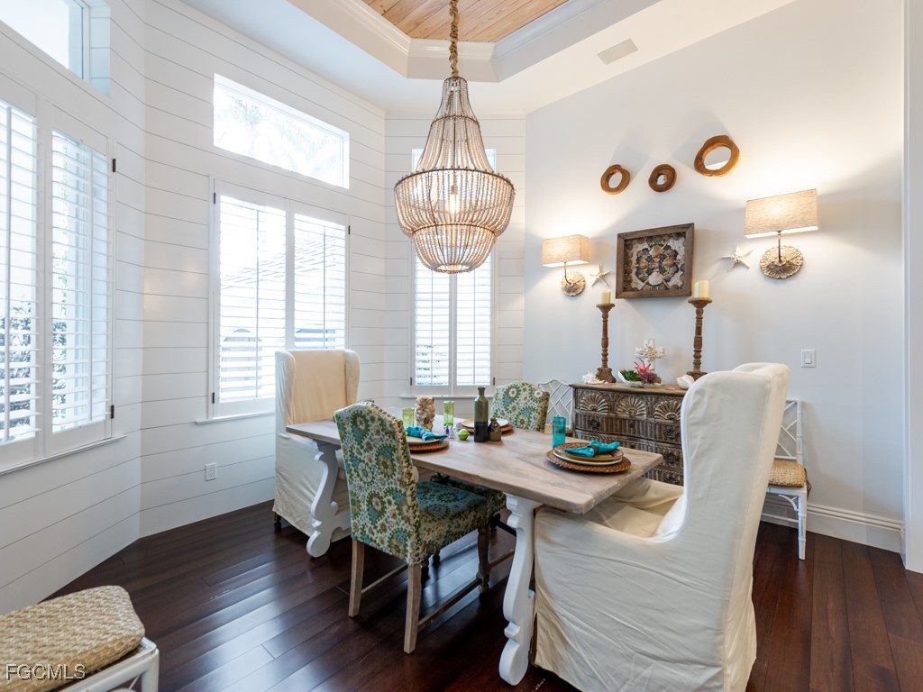 2388 Wulfert Road Sanibel, FL 33957 - Photo 11 of 49 a view of a dining room with furniture window and wooden floor