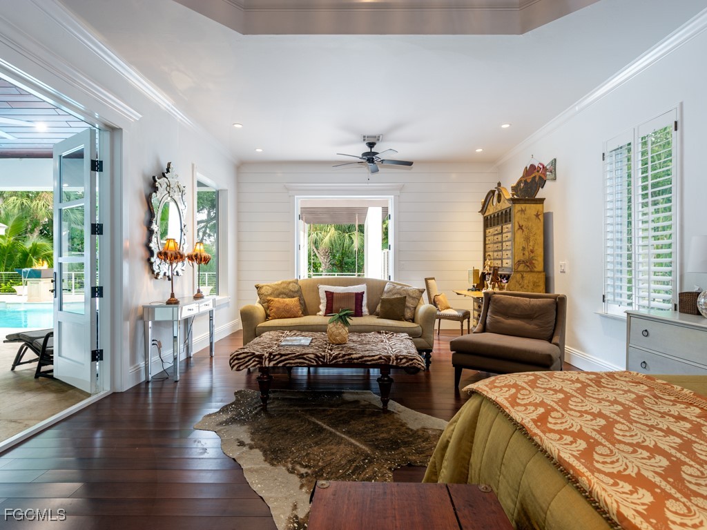 2388 Wulfert Road Sanibel, FL 33957 - Photo 19 of 49 a living room with furniture and wooden floor