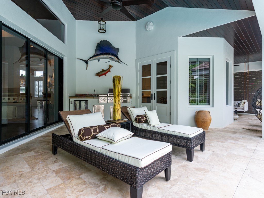 2388 Wulfert Road Sanibel, FL 33957 - Photo 29 of 49 a outdoor space with patio the couches and a dining table with garden view