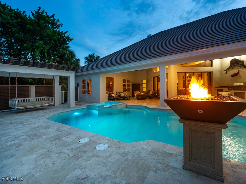 2388 Wulfert Road Sanibel, FL 33957 - Photo 39 of 49 a view of a backyard with a patio