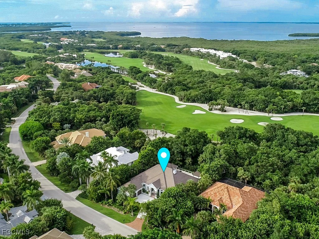 2388 Wulfert Road Sanibel, FL 33957 - Photo 4 of 49 an aerial view of a houses with yard